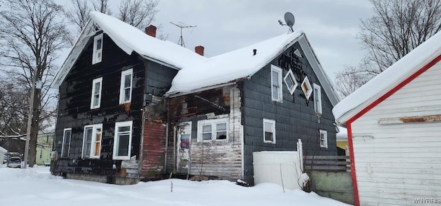 view of snow covered property