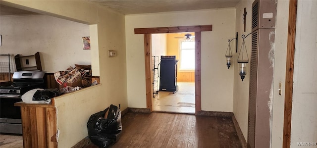 corridor featuring hardwood / wood-style floors