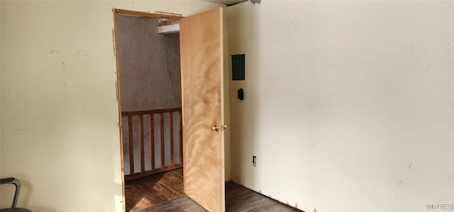 stairs with wood-type flooring