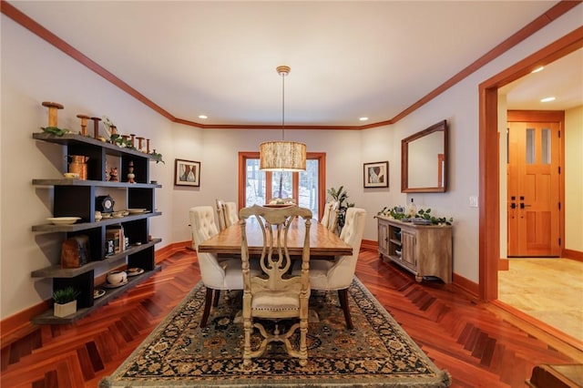 dining area with crown molding and parquet flooring