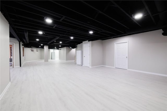 basement with light wood-type flooring