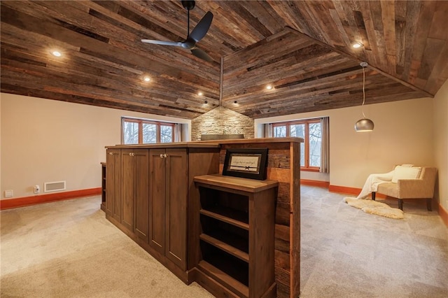 bar with a wealth of natural light, light colored carpet, pendant lighting, and wooden ceiling