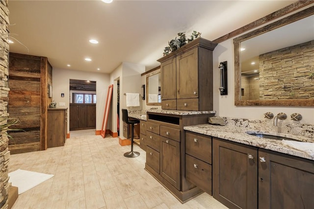 bathroom featuring vanity and hardwood / wood-style flooring