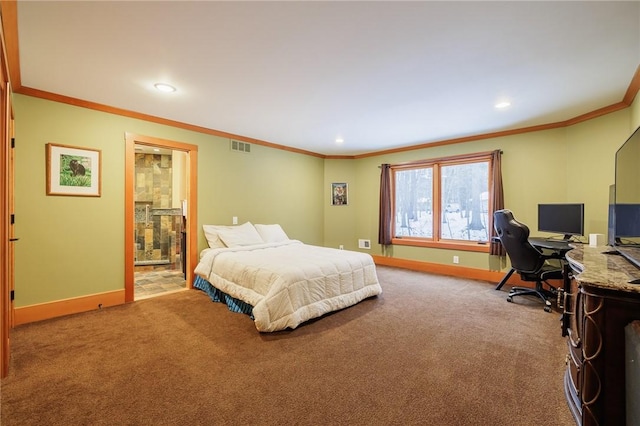 bedroom with ornamental molding, carpet flooring, and connected bathroom