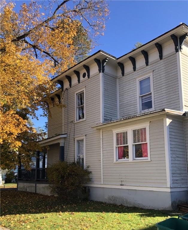 view of home's exterior featuring a yard