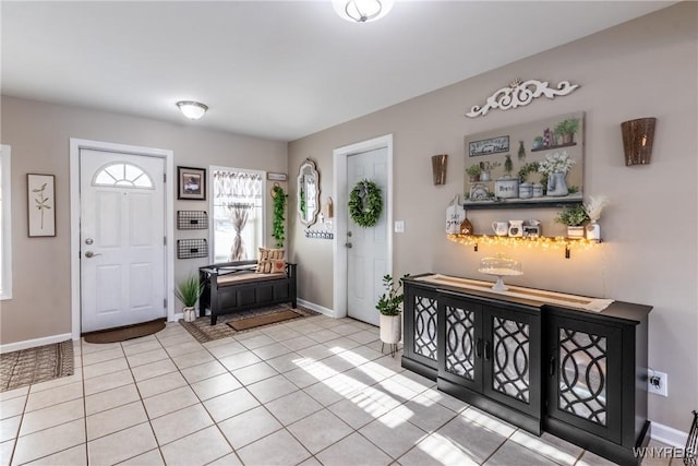 entrance foyer with light tile patterned floors