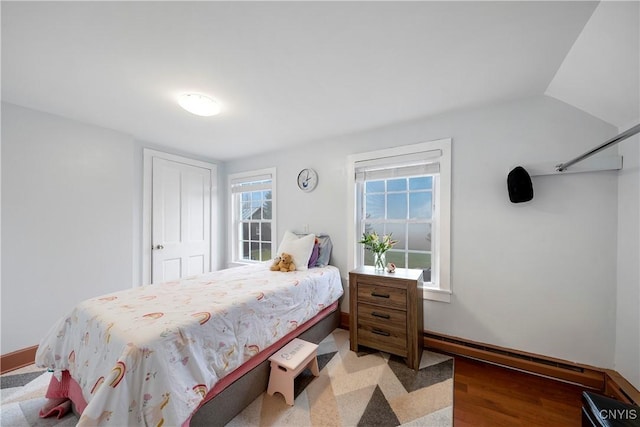 bedroom featuring hardwood / wood-style floors