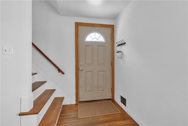 foyer featuring hardwood / wood-style floors