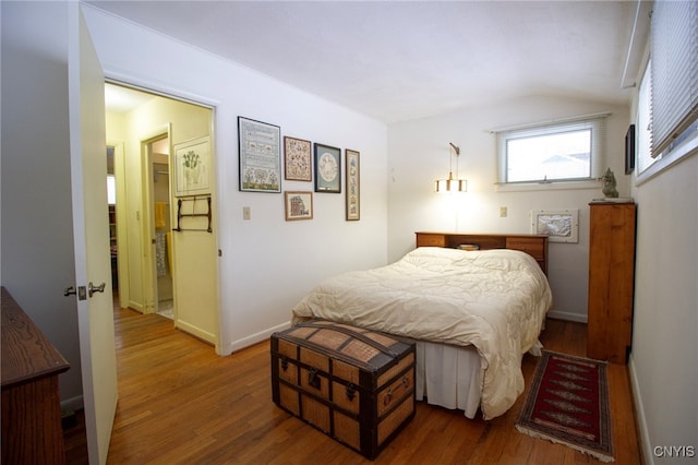 bedroom featuring hardwood / wood-style flooring