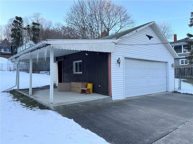 view of snow covered garage