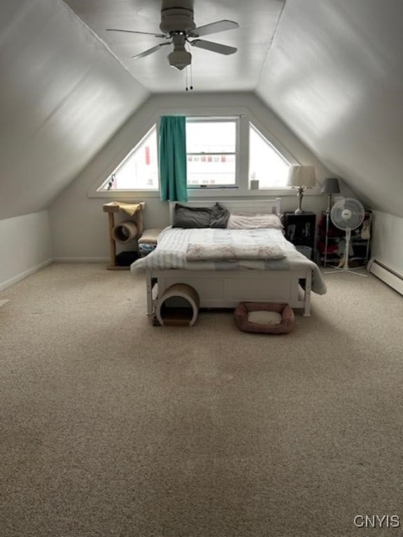 unfurnished bedroom with vaulted ceiling, ceiling fan, carpet, and multiple windows