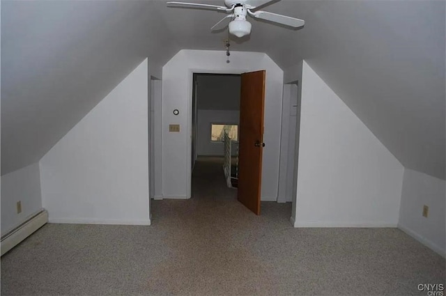 bonus room with light carpet, a baseboard heating unit, vaulted ceiling, and ceiling fan