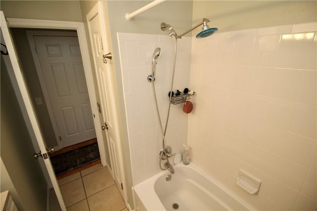 bathroom featuring tile patterned floors and shower / washtub combination