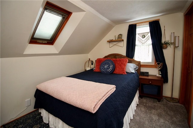 carpeted bedroom featuring vaulted ceiling and a textured ceiling