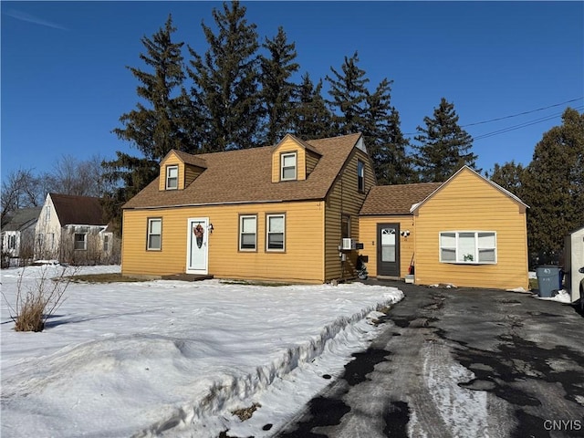 view of new england style home