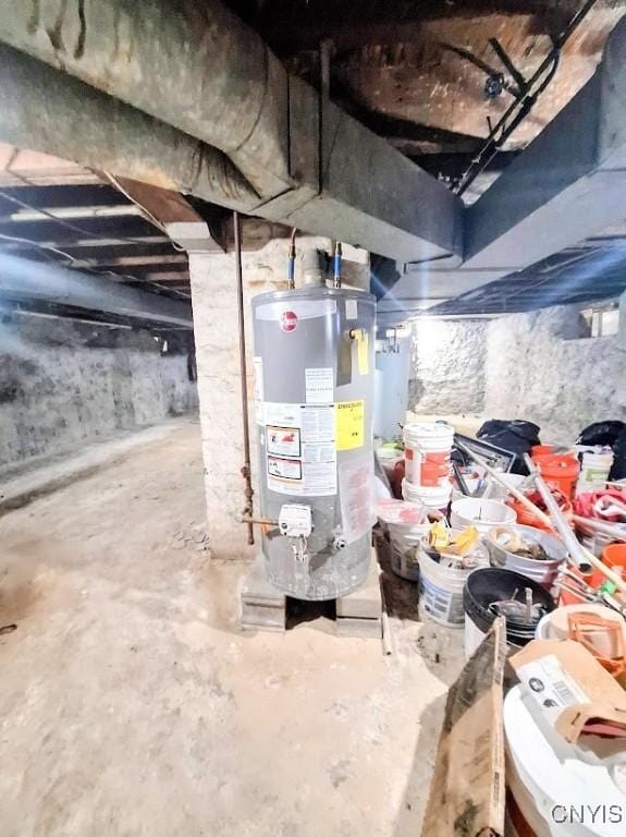 utility room featuring gas water heater