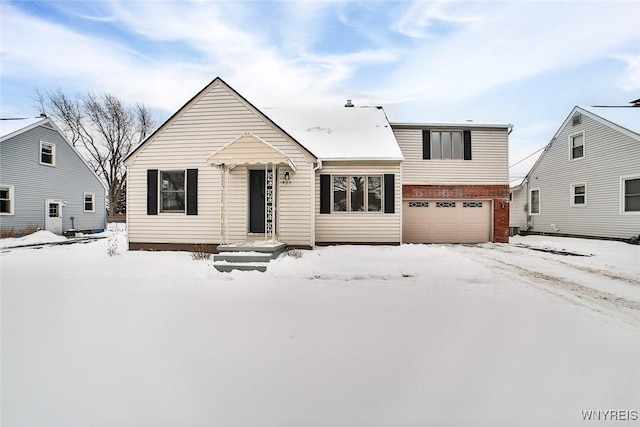 view of front of property with a garage