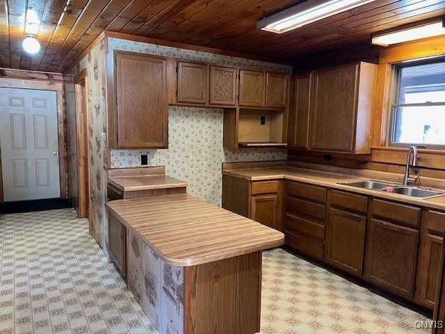 kitchen with sink and wood ceiling