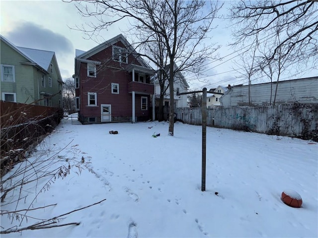 view of yard covered in snow