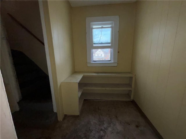 interior space featuring wood walls