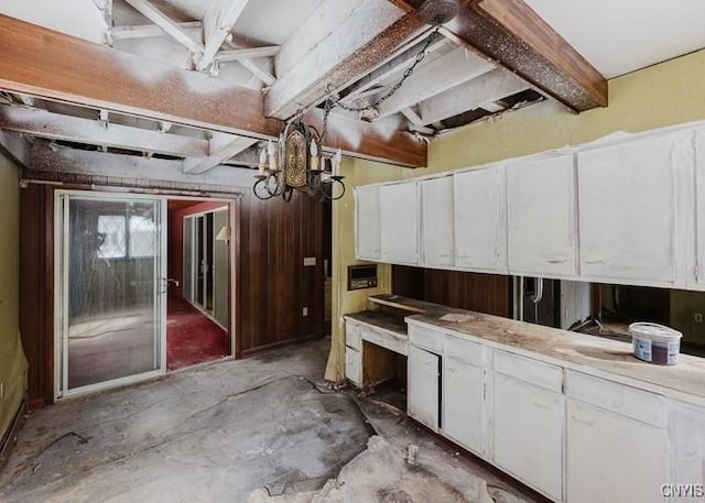 kitchen featuring white cabinets and light countertops