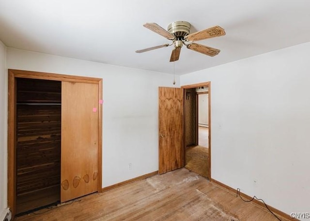 unfurnished bedroom with ceiling fan, light wood finished floors, a closet, and baseboards