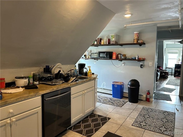 kitchen featuring light tile patterned flooring, black dishwasher, sink, white cabinets, and a baseboard heating unit