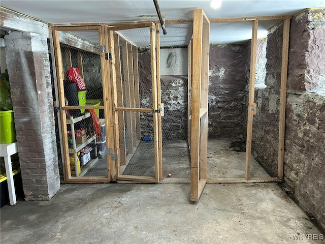 misc room with concrete flooring