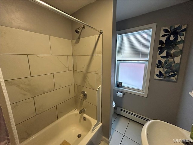 bathroom featuring tiled shower / bath combo, a baseboard radiator, tile patterned floors, and toilet