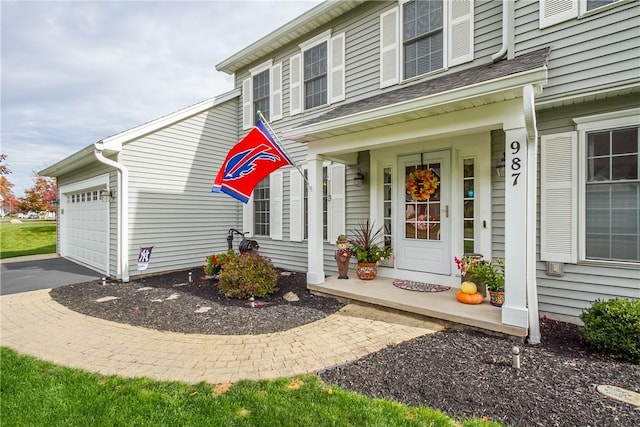 property entrance with a garage