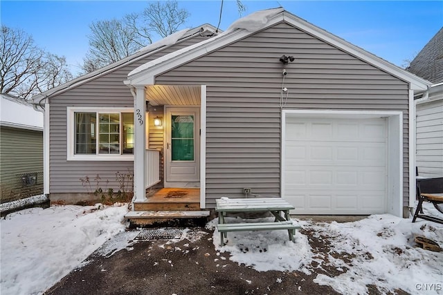 view of front of home with a garage