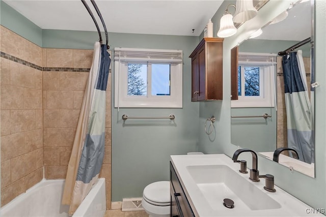 full bathroom featuring vanity, toilet, and shower / bath combo