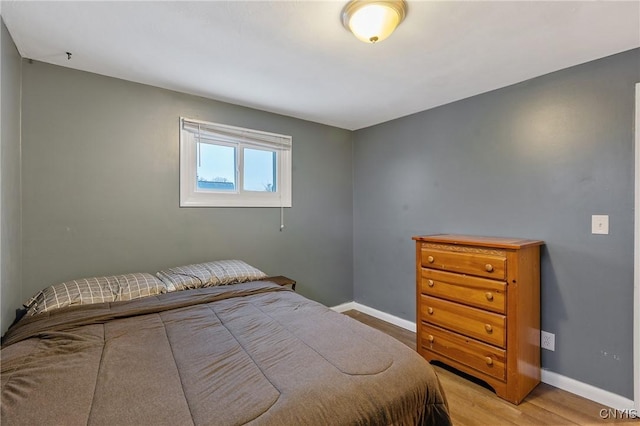 bedroom with light hardwood / wood-style flooring