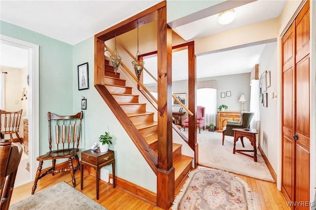 stairway with wood-type flooring