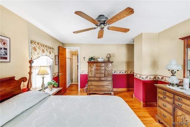 bedroom featuring ceiling fan and light hardwood / wood-style flooring