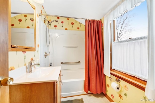 bathroom with vanity and shower / bath combination with curtain