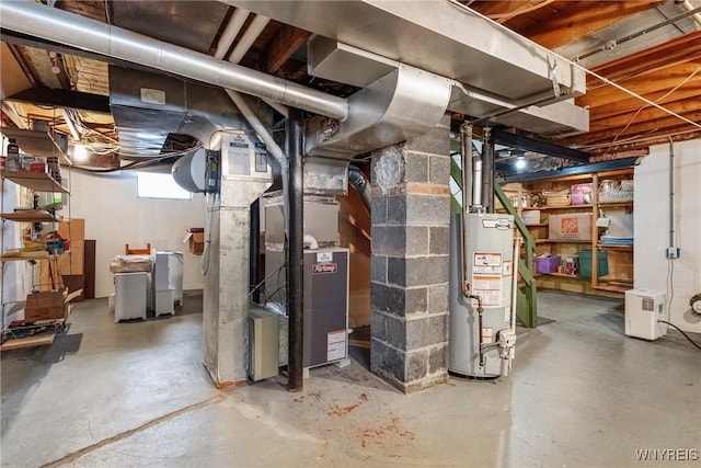 utility room featuring water heater