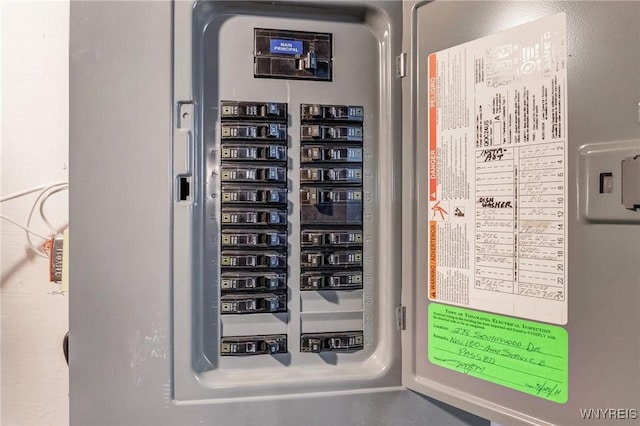 utility room featuring electric panel