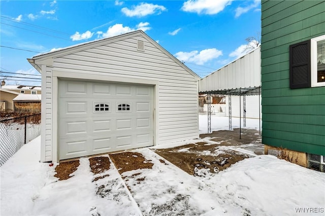 view of snow covered garage