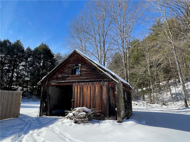 view of snow covered garage