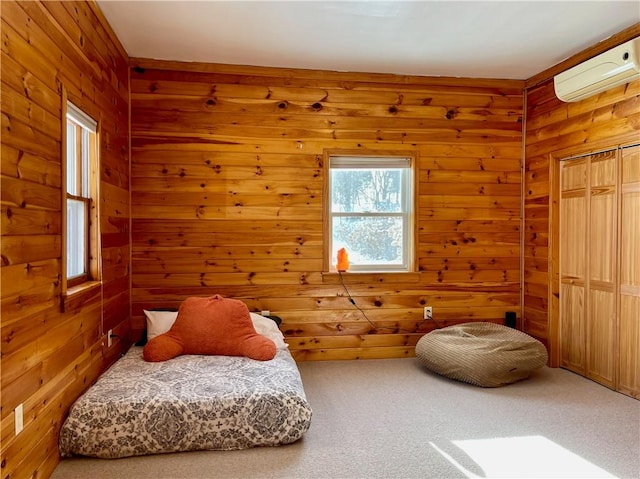 3843 Charlotte Creek Rd, Davenport, NY 13750 - carpeted bedroom featuring an AC wall unit, wood walls, and a closet