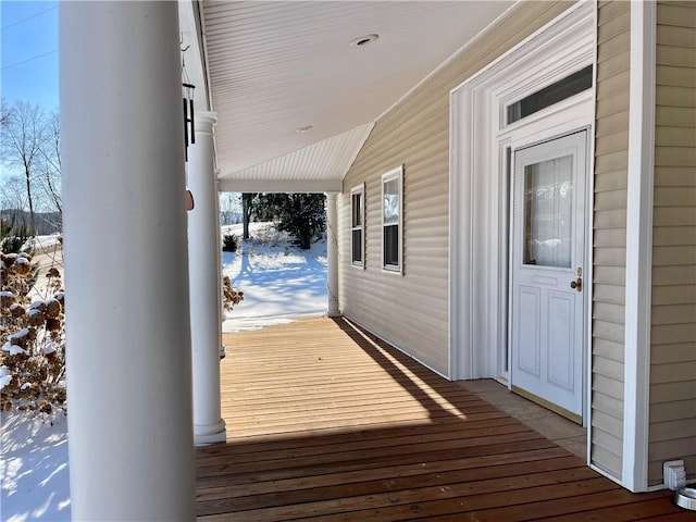 view of snow covered deck