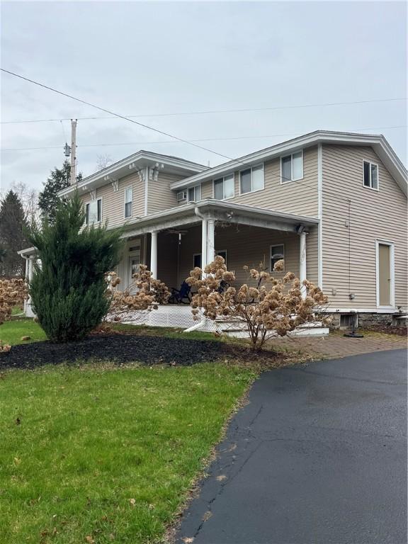3843 Charlotte Creek Rd, Davenport, NY 13750 - view of front of property with a front yard and covered porch