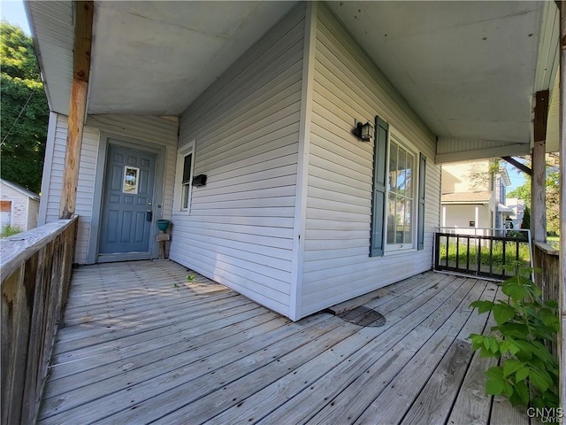 wooden deck featuring a porch