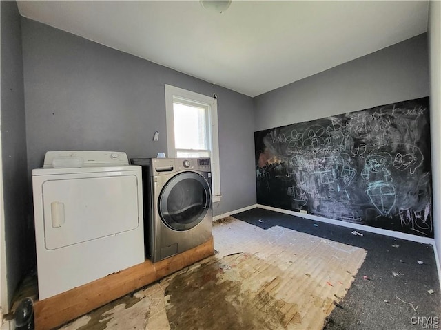 laundry room featuring separate washer and dryer