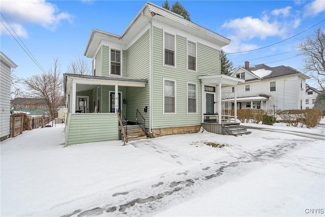 view of front of property featuring covered porch