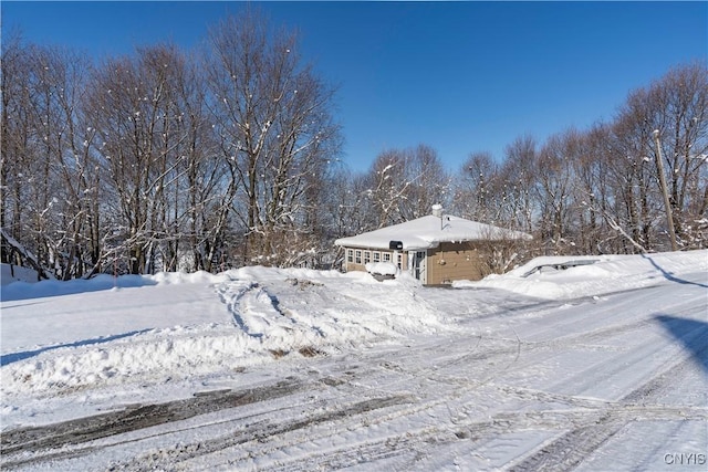 view of yard covered in snow