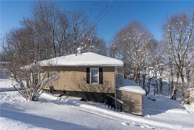 view of snow covered property