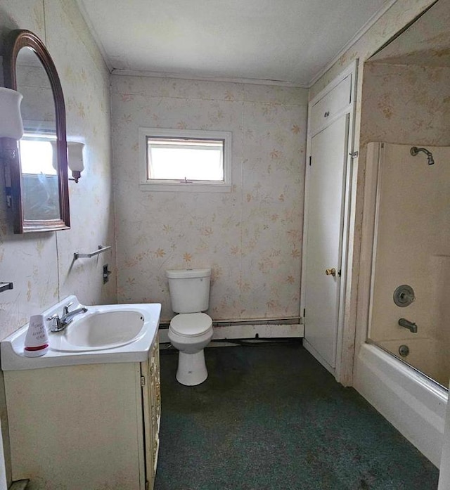 full bathroom featuring vanity, toilet, baseboard heating, and shower / tub combination