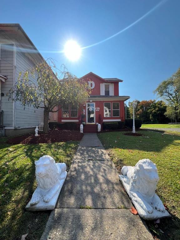 bungalow with a front lawn